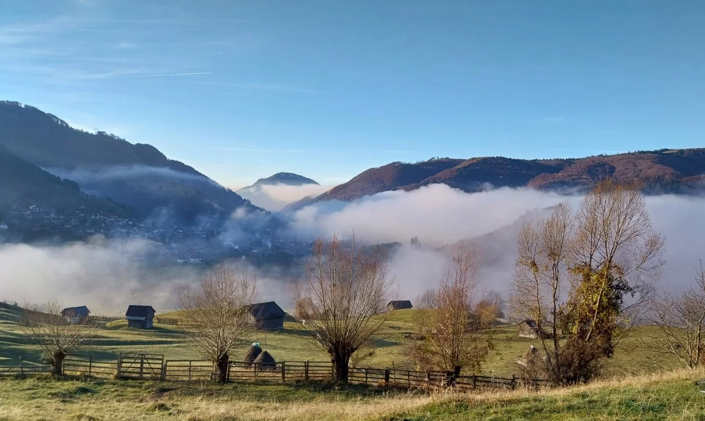 Morning fog over the mountains in Rucar, authentic mountain landscape